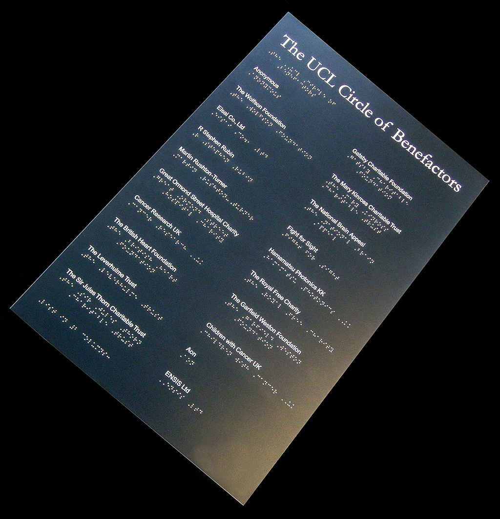 Braille and tactile engraved plaque for The LCC Cancer Research Fund
